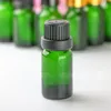 Bottiglia di vetro verde olio essenziale 10 ml con contagocce in vetro / tappo antimanomissione nero 10 ml E Bottiglie liquide 768 Pz / lotto