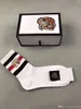 Calcetines de diseñador para hombre bordados con tigre 2 blancos + 1 negro + 1 gris con caja original Calcetines deportivos de algodón unisex a rayas jacquard 4 pares / caja