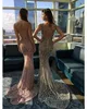 Qatar 2024 Vestidos de noche de sirena Berta de lujo Cuentas sin espalda Trompeta Vestidos de baile Sin mangas Lentejuelas de cristal Vestidos de fiesta de ilusión sexy HY382