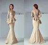 Champagne Lace Stain Peplum Long Evening Formell Wear Dresses 2018 Sheer Neck Långärmad Dubai Arabisk Mermaid Prom Dress