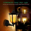 NIEUW LED TORCH LICHT 96 LEDS SENSOR ONDERWALL LAMP IP65 Waterdicht flikkeren vlammen Solar Landscape Licht voor tuinpad Decor