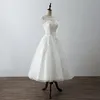 2022 Photo réelle longueur de thé robe de mariée courte pas cher col transparent avec dentelle Applique Cap manches courtes Corset dos Tulle mariage de style campagnard