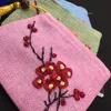 Ruban à main broderie petit sac zippé pochette pour carte en toile de jute sacs cadeaux de noël femmes porte-monnaie faveurs de fête sac à pompon en tissu superposé 10 pièces/lot