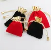 Ganze Velvet Perlen -Kordelzugbeutel 100pcslot 2Colors 2 Größen Schmuck Verpackung Weihnachten Hochzeitsgeschenktaschen Black Red2909382