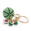 Anneaux de clés Fashion Creative Green Melon Boule Pendentif Pendentif Bague Porte-clés en métal Porte-clés pour femmes Sac Keyfobs K340