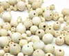 Livraison gratuite 500 pièces perles de bois rondes naturelles en vrac perles d'espacement pour la fabrication de bijoux bricolage européen 6 8 10 12 14mm