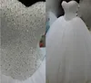 Puffy Beaded Bröllopsklänningar Robe de Marie Brudklänning Golvlängd Tulle Coret Back Ball Gown Gowns QC1099