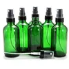 زجاجات الزجاجة الخضراء مع بخاخ مضخة بخاخ أسود جميل مصممة للزيوت العطرية منتجات تنظيف زجاجات الروائح