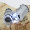 Mini microscope de poche à loupe 60 fois avec lumière ultraviolette et collection de lumière LED, un outil indispensable avec boîte de vente au détail