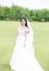 Stunning Ball Gown Wedding Dress Off Shoulder Lace-up Back Sweep Train Pleats TUlle applique with Sequins Beads Bridal Gowns Plus Size