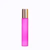 Mode 10 ml verre coloré bouteille d'huile essentielle parfum vide en acier inoxydable Rollerball parfum conteneur en gros LX3439