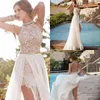 Halter Lace Top Sexig backless Beach Prom Dresses Empire Midja en linje pärlor midja delade kvällsklänningar boho klänningar dh528