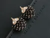 New animal ear studs electroplated paint black and white small earrings natural and fresh style bulk sales4001386