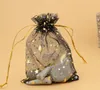 500 pcs sacs de fil bronzant cadeau bijoux sacs étoiles lune boucles d'oreilles Bracelet sac de rangement sacs de gaze colorée 9 * 12 CM