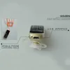 Hörlurar J8 Bluetooth Dialer Mini Mobiltelefon 0,66 tum med händerna gratis support FM Radio Micro Sim Card GSM Network med paketfria fartyg
