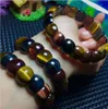 Natürliche Farbe Tigeraugen Hand Männer und Frauen Spezifikationen 15 * 10 mm Mode Kristall Schmuck Armbänder