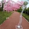 Décoration de mariage romantique cerisier fleur arbre route cité arc mariée et marié photographier les accessoires beaucoup de couleurs disponibles