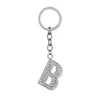 Cristal strass porte-clés porte-clés sac à main pour voiture mode mignon cadeau 26 lettres anglaises porte-clés créatif en alliage de zinc porte-clés