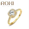 ROXI Anillos Modeschmuck Ringe für Frauen Weiß Roségold Farbe Zirkonia Umweltfreundlich Strass Eheringe
