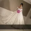 Robes de mariée de robe de balle bon marché sexy à épaules à manches longues appliques en dente