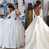 Vestidos de novia baratos de satén simple 2018 Nueva moda Grace A Line Vestido de novia sin espalda de manga larga Vestidos de novia reales atractivos por encargo