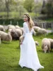 2019 Bedövning Strand Bröllopsklänningar V Nacke av axeln Illusion Lace Sleeves Öppna Back Boho Bohemian Country Style Bridal Gowns