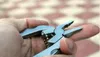 Högkvalitativ Portable Multi Function Folding Pocket Tools Plier Knife Keychain Skruvmejsel Multi-Purpose Combination Tang