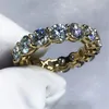 3色の愛好家インフィニティバンドリング925スターリングシルバーの婚約の結婚指輪4mm CZクリスタルビジュー
