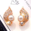 Pearl Örhängen Ingen genomborrad öronklämma för kvinnor med Österrike Crystal Fashion Wing Shape Smycken Wholesale Support Dropshipping