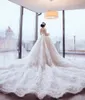 豪華な真珠のビーズのアップリケ結婚式のドレス魅力的なアラビア王女のウェディングドレス素晴らしいボールガウンチュールチャペル電車のブライダルガウン
