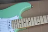 Factory Wholesale Green Electric Guitar with White Pickguard,SSS Pickups,Maple Fretboard,Can be Customized as Request