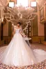 Modest A Line Wedding Dresses 2020 Illusion Sheer Neck Cap Sleeves Lace Appliqued Court Train Tulle Bridal Gowns Custom Made
