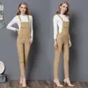 Kvinnor gul hög midja skinny jeans overalls kvinnliga khaki plus storlek denim playsuits damer penna denim långa bodycon byxor