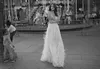 Liz Martinez Wedding Dress Sheer Spaghetti Feather Design paljetter Bröllopsklänningar Sexig rygglös golvlängd Brudklänningar