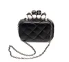 Wholesale- new vintage Skull purse Black Skull Knuckle Rings Handbag Clutch Evening Bag The chain inclined shoulder bag js290