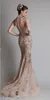 Zuhair Murad 2020 Abiti da sera Collo alto Sweep Train Champagne Sirena Abiti da ballo Appliques Bottoni Indietro Abito per occasioni speciali