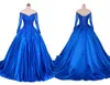 V Neck Niebieska sukienka wieczorowa z długimi rękawami Koronki Linia Princess 2022 Aplikacja Iluzja Cekinowa Zroszona gorset Powrót Quinceanera Party Dress