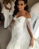 2024 New African Mermaid Wedding Dresses Off Shoulder Lace Appliques Pearls Plus Size Open Back Chapel Train Formal Bridal Gowns Vestido 403