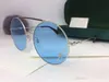 Luxe 3203 lunettes de soleil pour femmes Design mode lunettes de soleil Wrap lunettes de soleil sans cadre revêtement miroir lentille en fibre de carbone jambes Style d'été