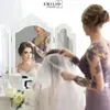 Lilac Mermaid Sheer Neck Long Sleeves Sweep Train Bridesmaid Gowns With Lace Applique Illusion Back Formal Dresses