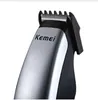 Kemei tondeuse à cheveux Portable électrique sans fil Mini rasoir professionnel tondeuse à barbe Machine à raser 3 peignes pour Men2527522