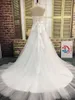 Real Pictures Plus Size Bröllopsklänningar Sweetheart Ärmlös Beaded Kristaller Pärlor Lace Appliques Lace-up Back Tulle Bridal Gown With Sash
