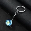 어두운 열쇠 고리에있는 빛나는 빛나는 지구 문 스타 갤럭시 우주 유리 카보 숑 키 반지 밴드가 패션 선물을 멈춘다