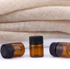 Wholesale 2000pcs China 1ml (1 4 dram) Amber Glass Essential Oil Bottle perfume sample tubes Bottle Mini with Plug and Black caps SN1576