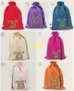 100 pièces/ot expédition rapide 37*27 cm style chinois brodé Floral soie sacs de rangement cordon pochette sous-vêtements sac