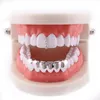 Fábrica inferior dentes grillz conjunto hip hop bling dental grills cz gelado para fora do dente boné jóias do corpo eua dentes inteiros access4666343