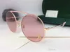 Luxe 3203 lunettes de soleil pour femmes Design mode lunettes de soleil Wrap lunettes de soleil sans cadre revêtement miroir lentille en fibre de carbone jambes Style d'été