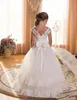 2019 Cute First Communion Sukienki dla dziewcząt Scoops Backless Aplikacje Kwiat Girls Sukienka Łuki Tulle Ball Suknia Korownicze Suknie Dla Małej Dziewczynki