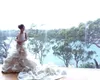 Luxuriöse Organza-Meerjungfrau-Hochzeitskleider Dubai Arabisch Schulterfrei Schatz Spitze Applikation Kapelle Zug Brautkleider Hochzeitskleid Custom