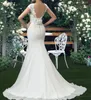 Mangas curtas de PO reais sem costas cetim sereia sereia vestidos de casamento barco pescoço de cintura fina apliques de flores vestido de noiva Vestid3206196